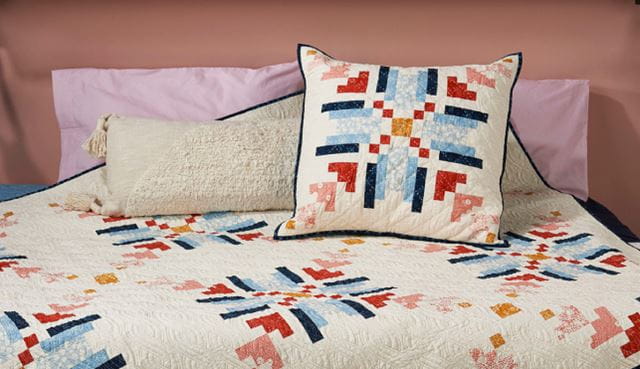 Knit-inspired snowflake quilt and cushion duo